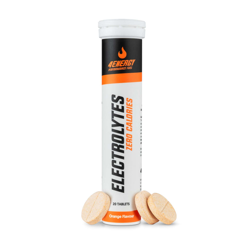 4Energy Electrolytes - 20 šumečih tablet okus pomaranče, tubica z črno-oranžnim pokrovčkom in navpičnim besedilom na belem ozadju.