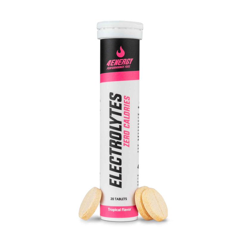 4Energy Electrolytes - 20 šumečih tablet tropskega okusa, cilindrična tubica s črnim pokrovčkom in rdečim pasom na belem ozadju.