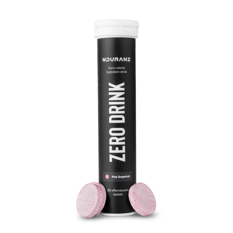 Nduranz Zero Drink - 20 šumečih tablet okus rožnatega grenivke, črna cilindrična tubica z navojnim pokrovčkom na belem ozadju.