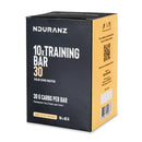 Nduranz Training Bar 30 Box - 10 x 45g okus vanilijevega orehovega nugata, črna škatla z rumenimi poudarki in vidnimi prehranskimi podrobnostmi.