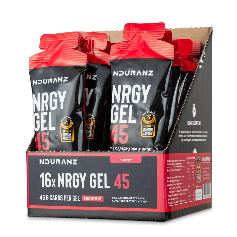 Nduranz Nrgy Gel 45 with Caffeine Box - 16 x 75 g okus češnje, rdeče‑črni paketki s prehranskimi informacijami na belem ozadju.